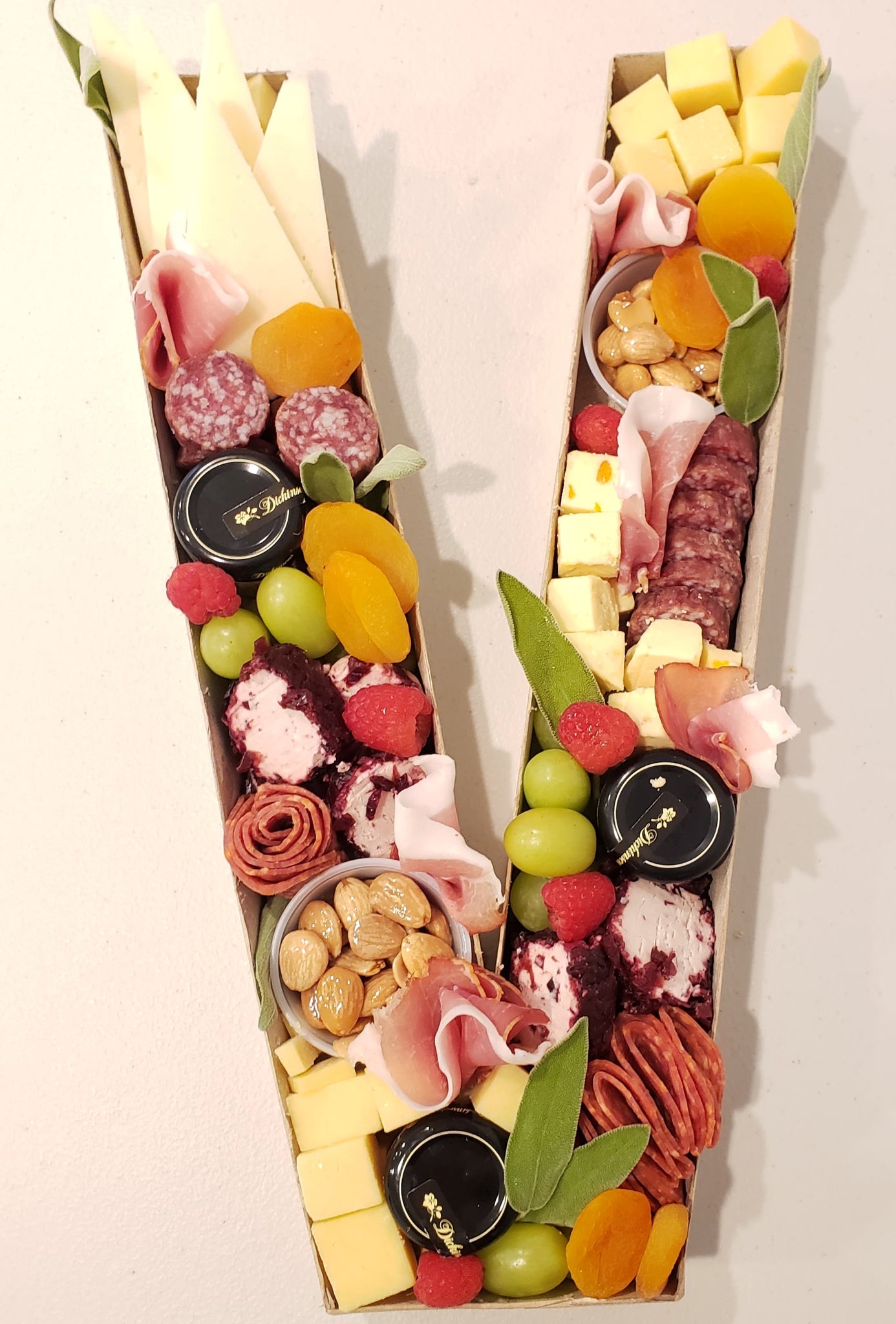 Letters in fruit and charcuterie vegetables  Charcuterie gifts, Party food  platters, Charcuterie and cheese board